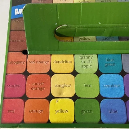 Colorful box of crayons with labeled shades including dandelion, cerulean, and fern.