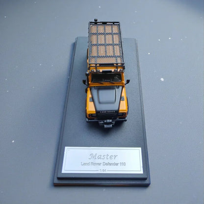 Master - Land Rover Defender 110 1:64 Scale Diecast Model Car | Off-Road SUV Collectible with Roof Rack & Kayak
