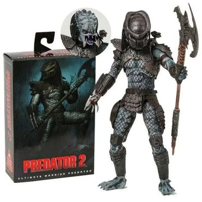Predator 2 Ultimate Warrior Predator action figure with weapon next to display box
