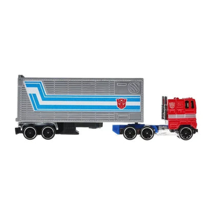 Red and grey toy semi truck with blue stripes and Autobot symbol, collectible die-cast vehicle