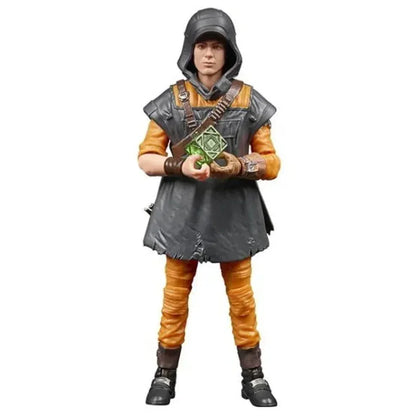 Action figure in medieval-style armor holding a green geometric accessory, collectible toy