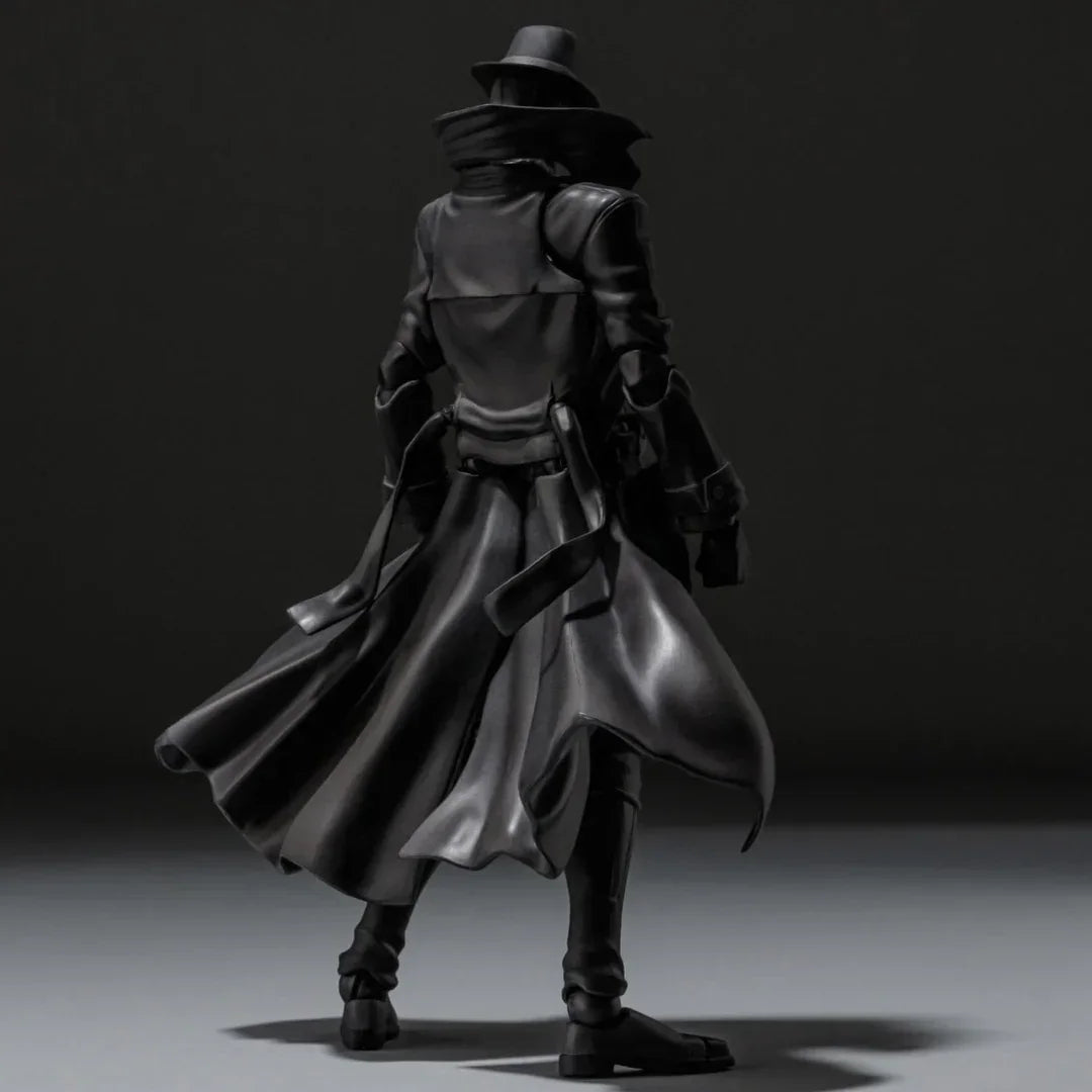 Black collectible action figure in long coat and hat, dramatic shadows, toy photography