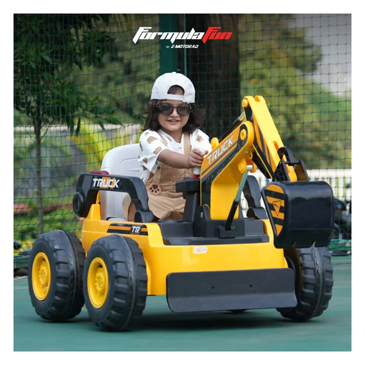 Child playing with a toy bulldozer in an outdoor setting, with 'Formula Fun' branding visible.