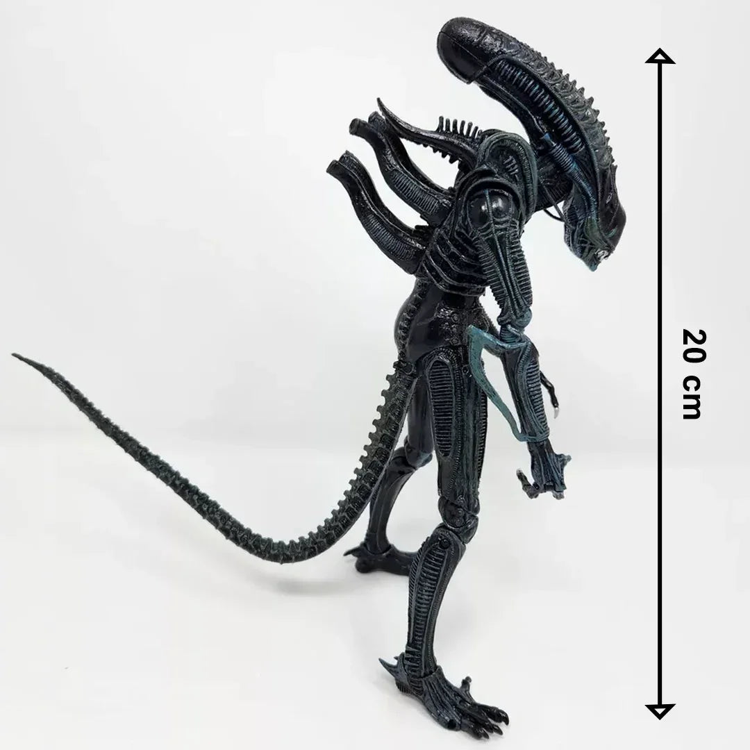 20 cm tall black alien action figure with detailed ridges and long tail on white background