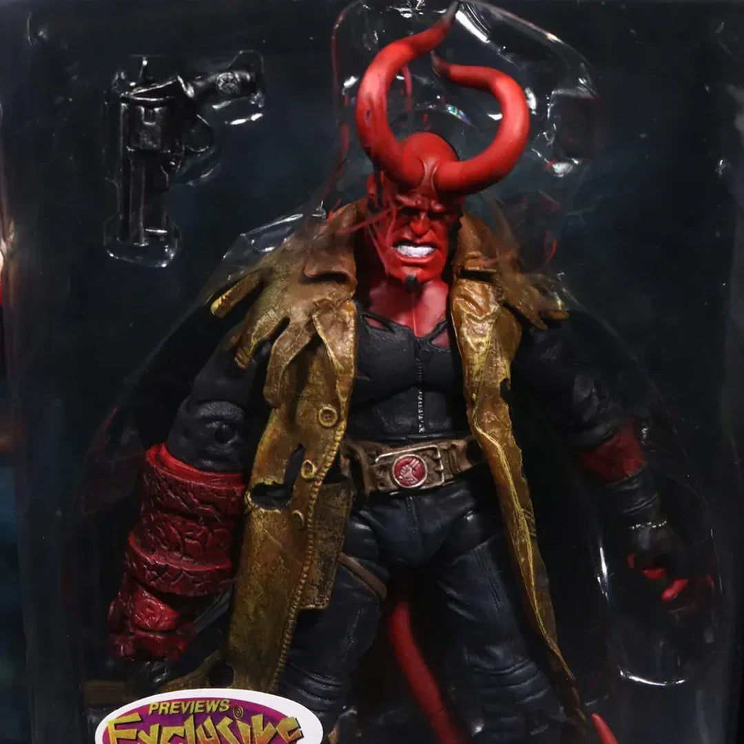 Red demon action figure with large horns, trench coat, and gun accessory in box