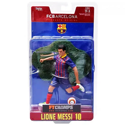 Barcelona football action figure in red and blue uniform kicking a soccer ball in packaging