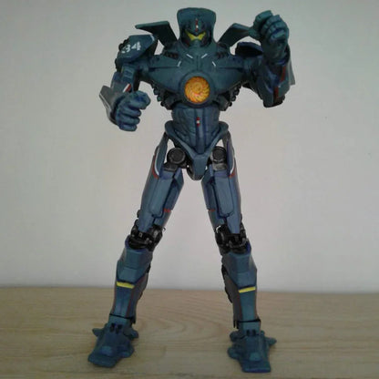 blue robot action figure toy with glowing chest detail on a wooden surface