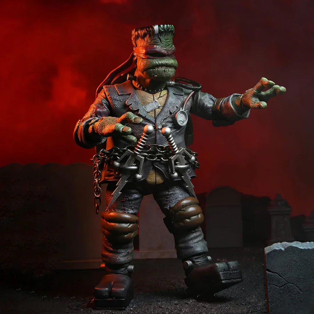 Frankenstein-inspired action figure in chainsuit with bolts, posed in spooky graveyard setting