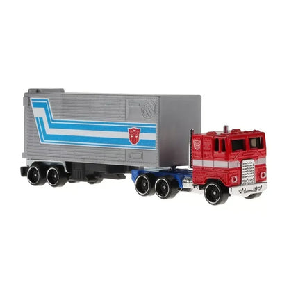 Die-cast collectible red and gray toy truck with trailer and blue stripes, Autobot logo visible